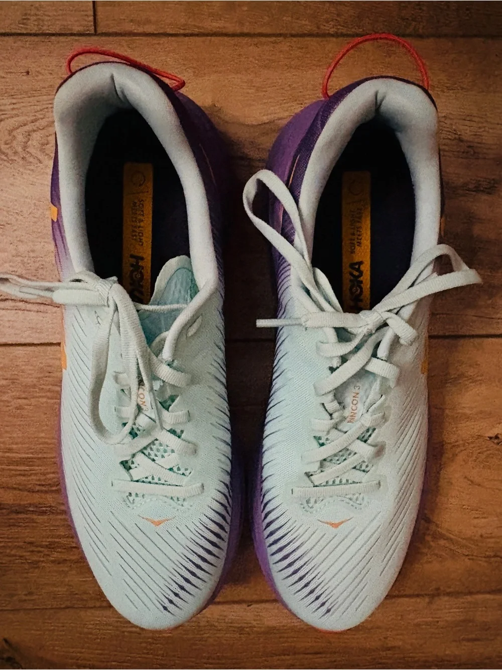 Hoka Women's Mint and Lavender Athletic Running Shoes with Orange Logo